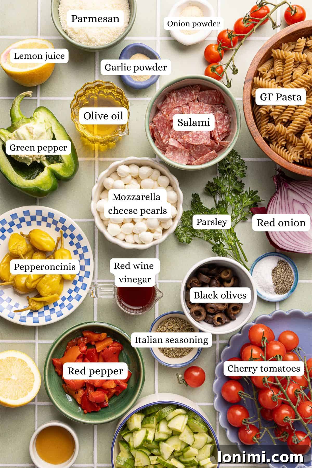 Gluten-Free Italian Pasta Salad Recipe for Delicious Summer Meals 3 Ingredients for gluten free pasta salad arranged and labeled on a countertop.