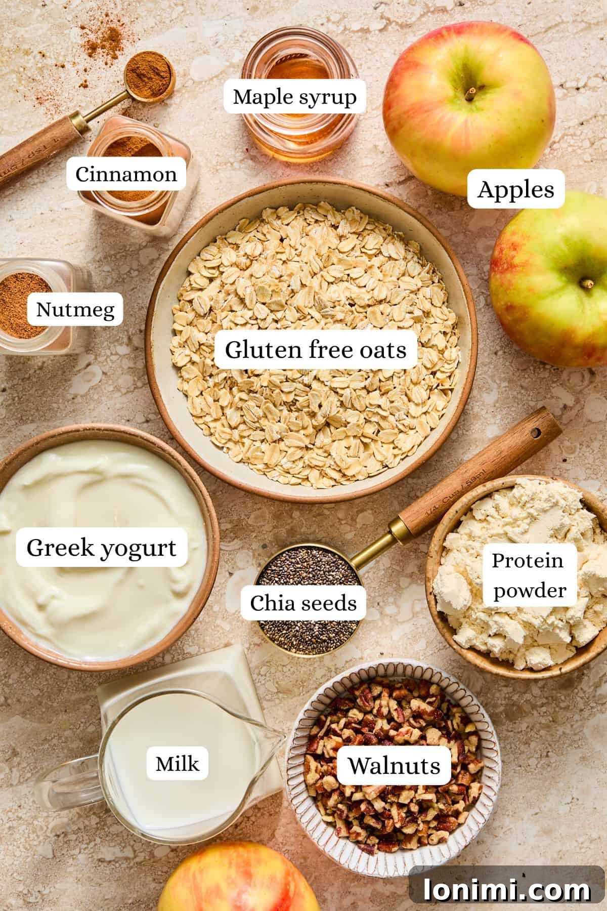 Apple Pie Protein Overnight Oats 3 apple pie overnight oats ingredients in nesting bowls
